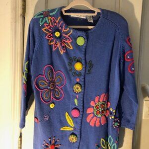 This Michael Simon NY vintage cardigan is a unique piece featuring 1950s car app